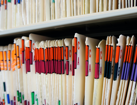 row of medical file folders