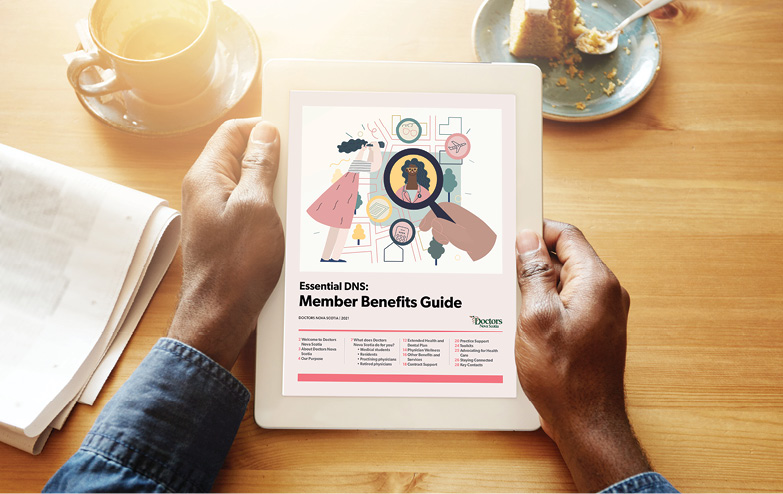 Member benefits guide held in hands