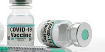 two vials of covid-19 vaccine
