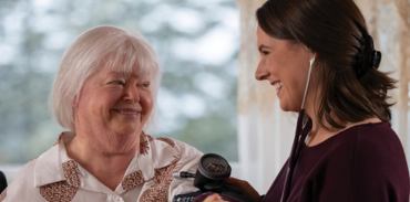 Dr. Robyn Pierce with a female patient