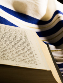 Hebrew prayer book and a tallit, a Jewish prayer shawl