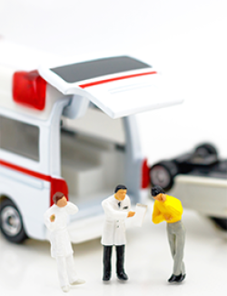miniature people at scene of automobile accident