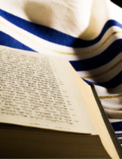 Hebrew prayer book and a tallit, a Jewish prayer shawl
