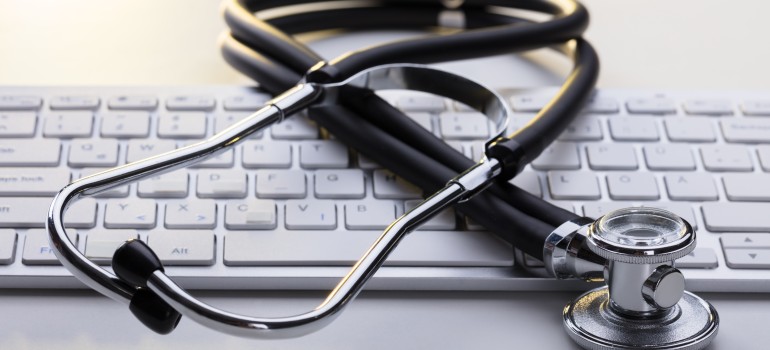 A stethoscope on keyboard