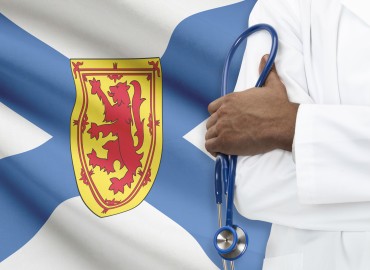 image of NS flag and side profile of physician standing infront the flag