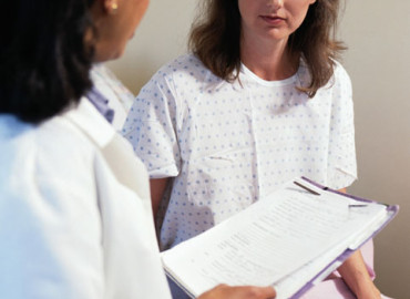 Stock image - doctor with a patient