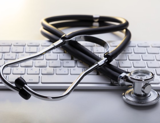 A stethoscope on keyboard