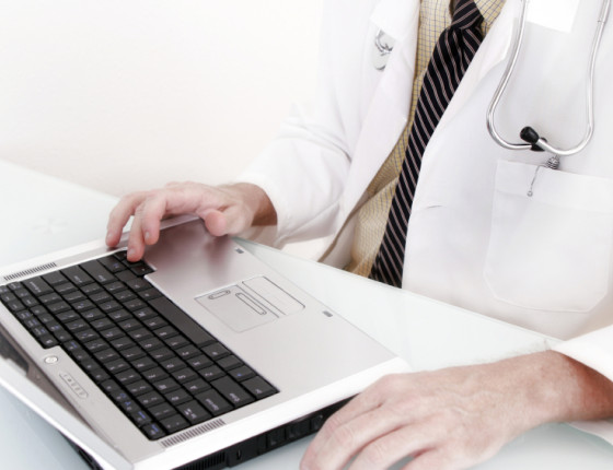 Doctor using a laptop