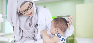 Doctor examining a patient