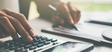 a person using a calculator
